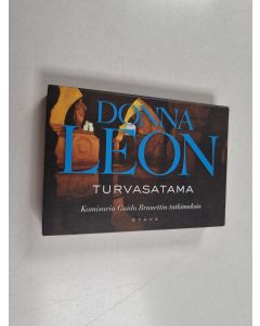 Kirjailijan Donna Leon käytetty kirja Turvasatama (Miki-kirja)