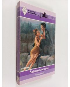 Kirjailijan Virginia Hart käytetty kirja Sateenkaaren pää