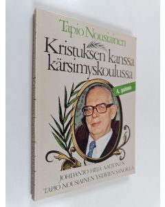 Kirjailijan Tapio Nousiainen käytetty kirja Kristuksen kanssa kärsimyskoulussa
