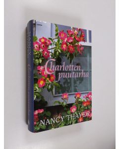 Kirjailijan Nancy Thayer käytetty kirja Charlotten puutarha