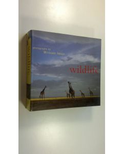 Kirjailijan Mitsuaki Iwage käytetty kirja Wildlife