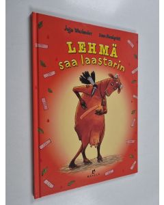 Kirjailijan Sven Nordqvist & Jujja Wieslander käytetty kirja Lehmä saa laastarin