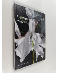 Kirjailijan Iris Kiiskinen käytetty kirja Elämän tehtävää = Some small tasks offered to us by life = Quelques petites choses que la vie nous donne à faire