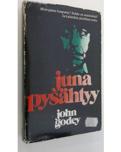 Kirjailijan John Godey käytetty kirja Juna pysähtyy