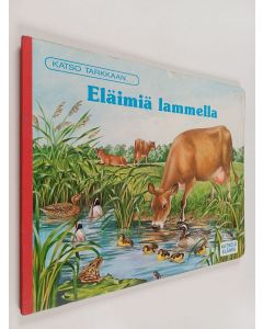 käytetty kirja Eläimiä lammella