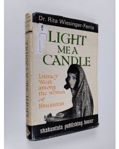 Kirjailijan Rita Wiesinger-Ferris käytetty kirja Light Me a Candle : two years of literacy and adult education work among the women of Khuzistan, Iran (signeerattu, tekijän omiste)