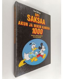 Kirjailijan Walt Disney käytetty kirja Opi saksaa Akun ja Mikin kanssa