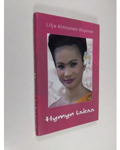 Kirjailijan Lilja Kinnunen-Riipinen käytetty kirja Hymyn takaa