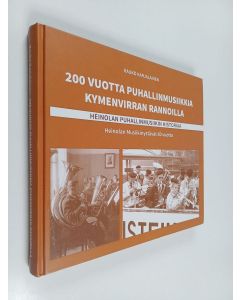 Kirjailijan Kauko Karjalainen käytetty kirja 200 vuotta puhallinmusiikkia Kymenvirran rannoilla - Heinolan puhallinmusiikin historiaa : Heinolan Musiikinystävät 80 vuotta