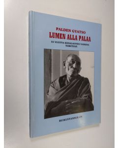 Kirjailijan Palden Gyatso käytetty kirja Lumen alla palaa