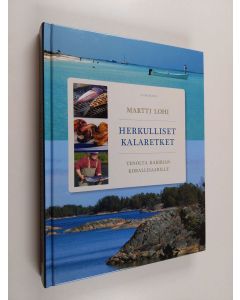 Kirjailijan Martti Lohi käytetty kirja Herkulliset kalaretket : Tenolta Karibian korallisaarille
