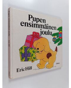 Kirjailijan Eric Hill käytetty kirja Pupen ensimmäinen joulu
