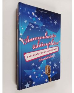 Kirjailijan Matti Huhta käytetty kirja Aamunkoista tähtivyöhön : laululyriikan fraasikirja