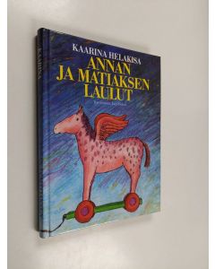 Kirjailijan Kaarina Helakisa käytetty kirja Annan ja Matiaksen laulut : Kaarina Helakisan lastenrunot vuosilta 1966-88