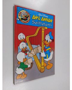 Kirjailijan Walt Disney käytetty kirja Aku Ankan soittotunti