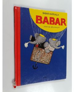 Kirjailijan Jean de Brunhoff käytetty kirja Babar matkalla