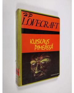 Kirjailijan H. P. Lovecraft käytetty kirja Kuiskaus pimeässä