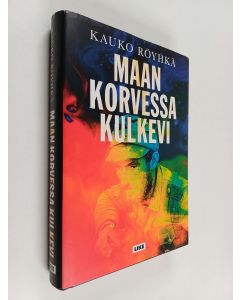 Kirjailijan Kauko Röyhkä käytetty kirja Maan korvessa kulkevi