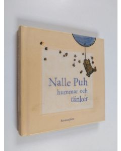 Kirjailijan A. A. Milne käytetty kirja Nalle Puh hummar och tänker