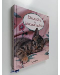 Kirjailijan Joan Moore käytetty kirja Kissanpäiviä ja kissamaisuuksia