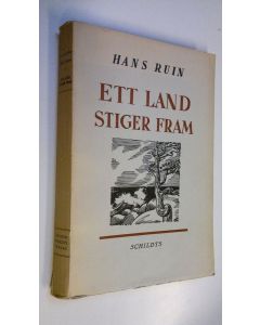 Kirjailijan Hans Ruin käytetty kirja Ett land stiger fram