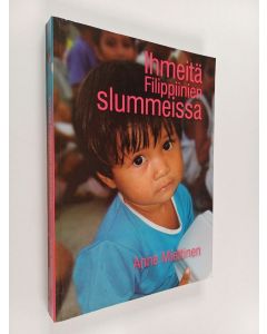 Kirjailijan Anne Miettinen käytetty kirja Ihmeitä Filippiinien slummeissa