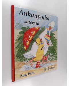 Kirjailijan Amy Hest käytetty kirja Ankanpoika sateessa
