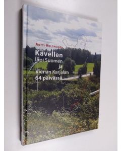 Kirjailijan Antti Holopainen käytetty kirja Kävellen läpi Suomen ja Vienan Karjalan 64 päivässä