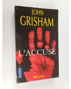 Kirjailijan John Grisham käytetty kirja L'accusé