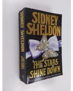 Kirjailijan Sidney Sheldon käytetty kirja The stars shine down
