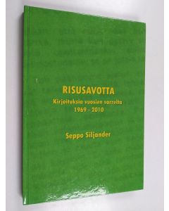 Kirjailijan Seppo Siljander käytetty kirja Risusavotta : kirjoituksia vuosien varrelta 1969-2010