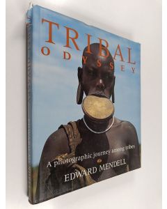 Kirjailijan Edward Mendell käytetty kirja Tribal Odyssey : A Photographic Journey Among Tribes