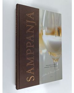 Kirjailijan Jukka Sinivirta & Päivi Sinivirta käytetty kirja Samppanja : naurun airut, onnen polttoaine