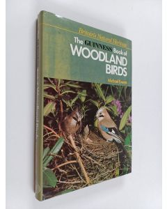 Kirjailijan Michael Everett käytetty kirja The Guinness Book of Woodland Birds