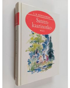 Kirjailijan L. M. Montgomery käytetty kirja Sateenkaarinotko