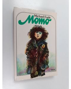 Kirjailijan Michael Ende käytetty kirja Momo : merkillinen tarina harmaista herroista ja tytöstä, joka antoi ihmisille takaisin ajan