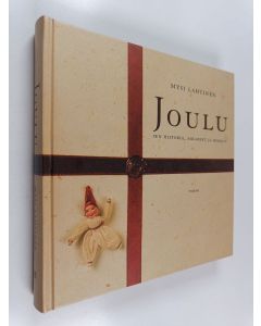 Kirjailijan Mysi Lahtinen käytetty kirja Joulu, sen historia, askareet ja herkut