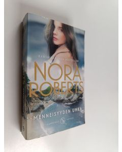 Kirjailijan Nora Roberts käytetty kirja Menneisyyden uhka