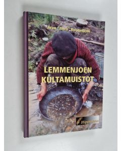 Kirjailijan Arvo Ruonaniemi käytetty kirja Lemmenjoen kultamuistot
