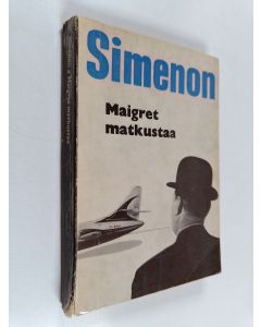 Kirjailijan Georges Simenon käytetty kirja Maigret matkustaa : Komisario Maigret'n tutkimuksia