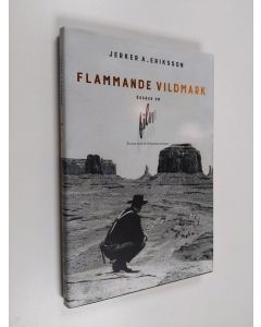 Kirjailijan Jerker A. Eriksson käytetty kirja Flammande vildmark : essäer om film