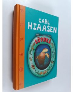 Kirjailijan Carl Hiaasen käytetty kirja Löyhkä