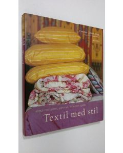 Kirjailijan Caroline Clifton-Mogg käytetty kirja Textil med stil : inred med siden, sammet, linne och spets
