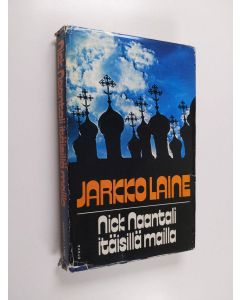 Kirjailijan Jarkko Laine käytetty kirja Nick Naantali itäisillä mailla : eli sille joka tästä pahaa ajattelee s.o. seikkailuja suvisessa Suomessa ja Neuvostojen maassa ynnä "Magno conatu nugas"