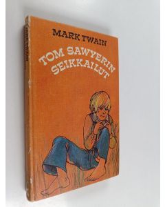 Kirjailijan Mark Twain käytetty kirja Tom Sawyerin seikkailut