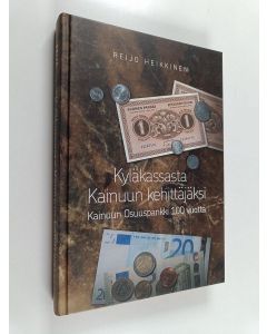 Kirjailijan Reijo Heikkinen käytetty kirja Kyläkassasta Kainuun kehittäjäksi : Kainuun Osuuspankki 100 vuotta
