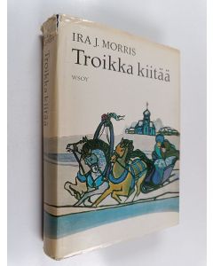 Kirjailijan Ira J. Morris käytetty kirja Troikka kiitää
