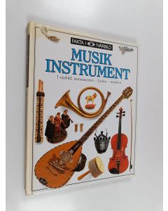 Kirjailijan Neil Ardley käytetty kirja Musikinstrument : I närbild: instrumenten, ljuden, musiken