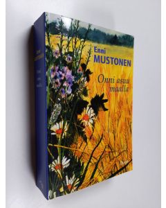Kirjailijan Enni Mustonen käytetty kirja Onni asuu maalla : Maitotyttö ; Saako olla muuta? ; Hukkakauraa