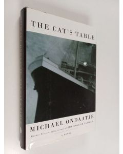 Kirjailijan Michael Ondaatje käytetty kirja The cat's table